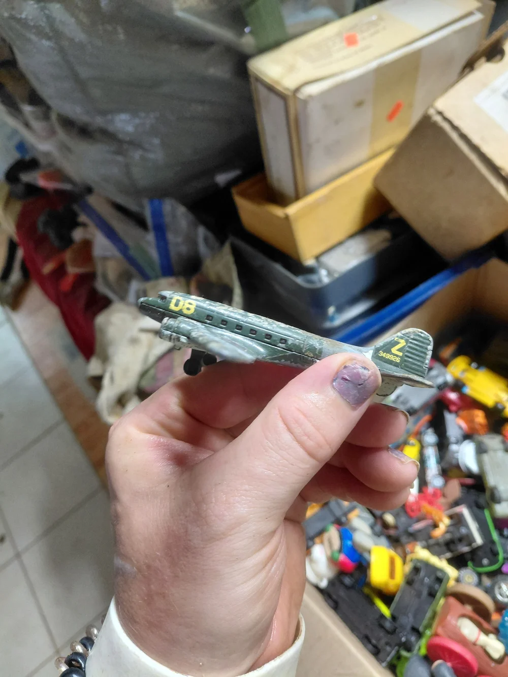 vintage-style diecast model of a World War II Douglas C-47 Skytrain (or Dakota)